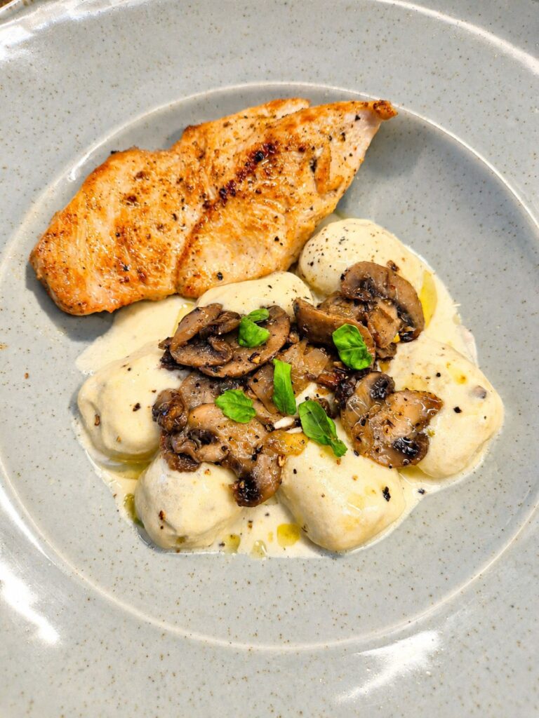 Sautéed Chicken Breast with Creamy Gnocchi and Sautéed Mushrooms